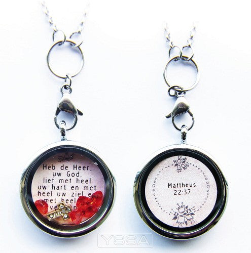 Goldcolored cross charm with red hearts